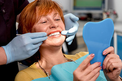 Kraska Center for Cosmetic and General Dentistry | Invisalign reg , Dental Bridges and Implant Dentistry